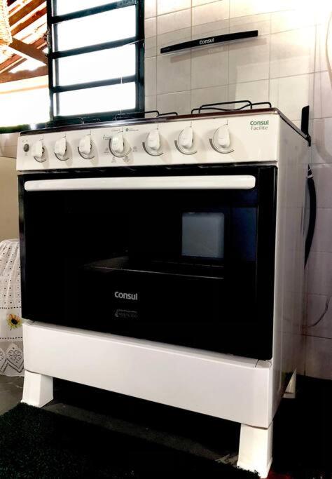 Chácara com piscina lareira forno e fogão à lenha!