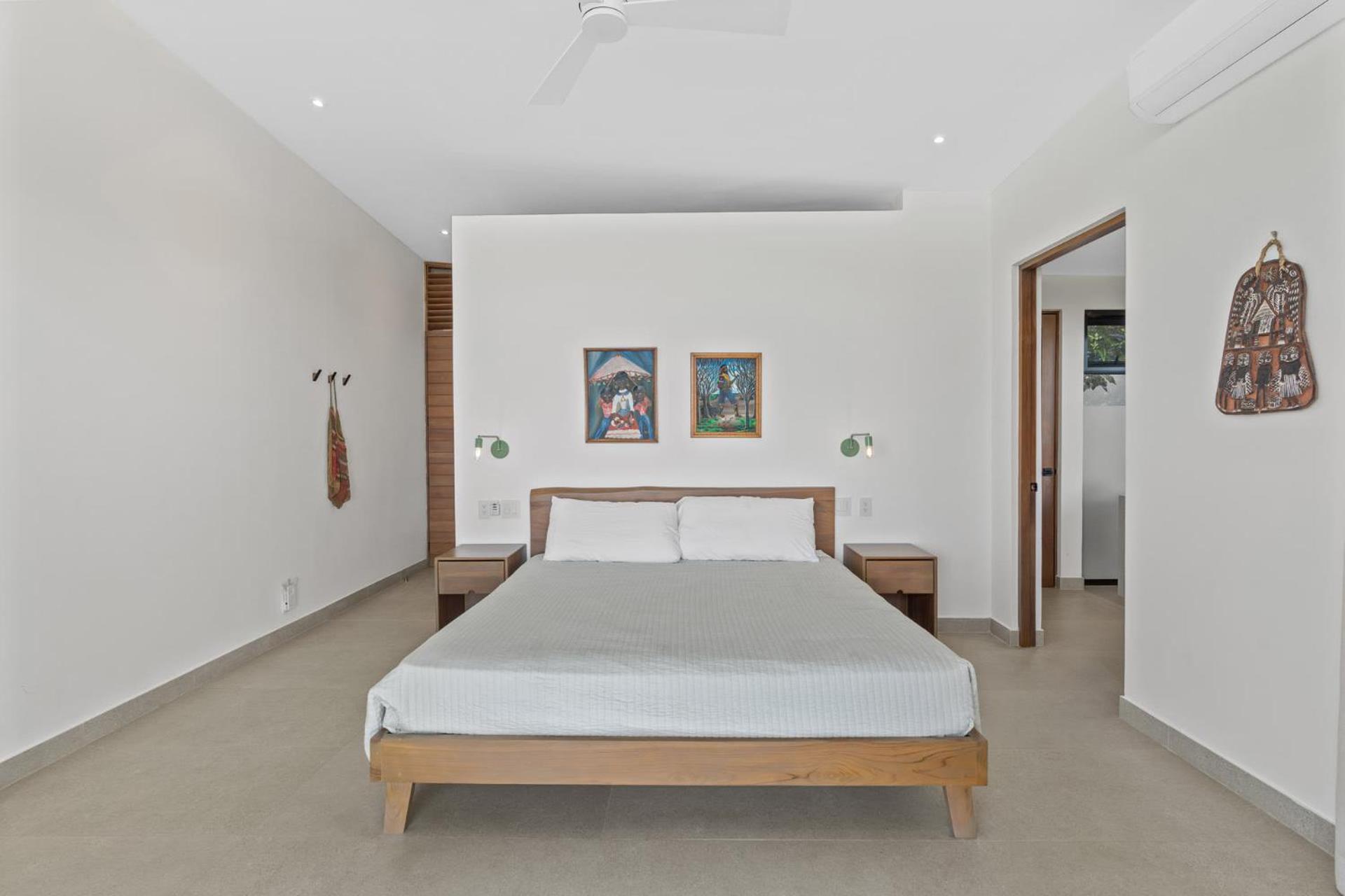 Luxurious Ultramodern Property with Private Suites, Infinity Pool, and Sweeping Ocean and Mountain Views