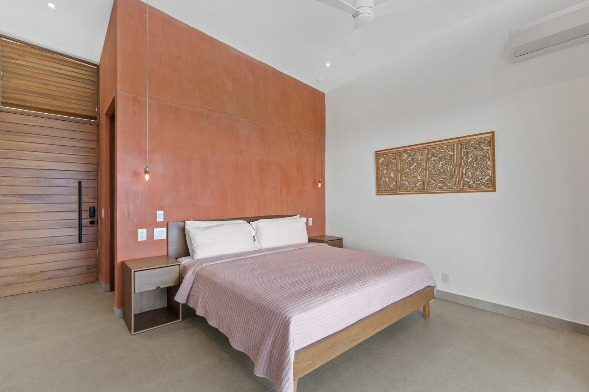Luxurious Ultramodern Property with Private Suites, Infinity Pool, and Sweeping Ocean and Mountain Views