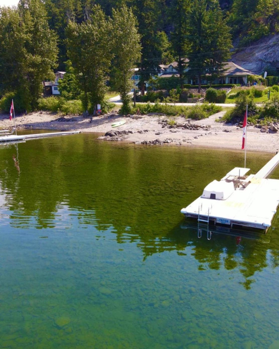 West facing Waterfront Cottage with private beach & buoy & dock access