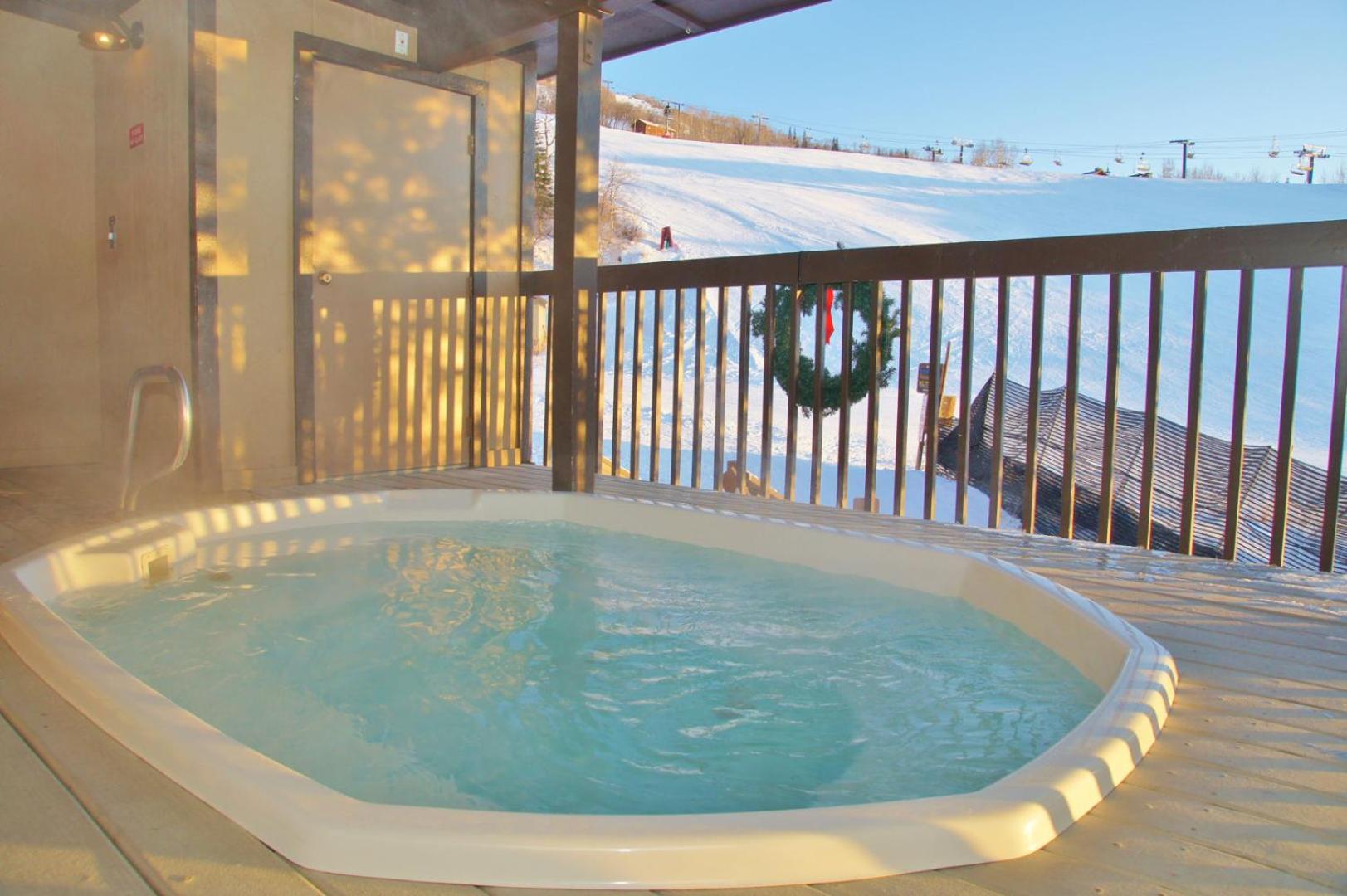 Outdoor Hot Tub, Ski right to & from your door, Private Shuttle view 4