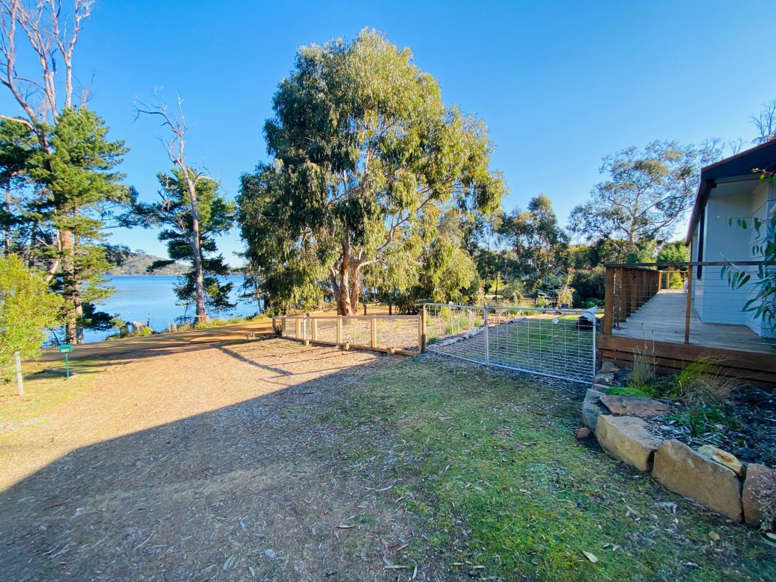 Fully fenced, wrap around decks, water on 3 sides