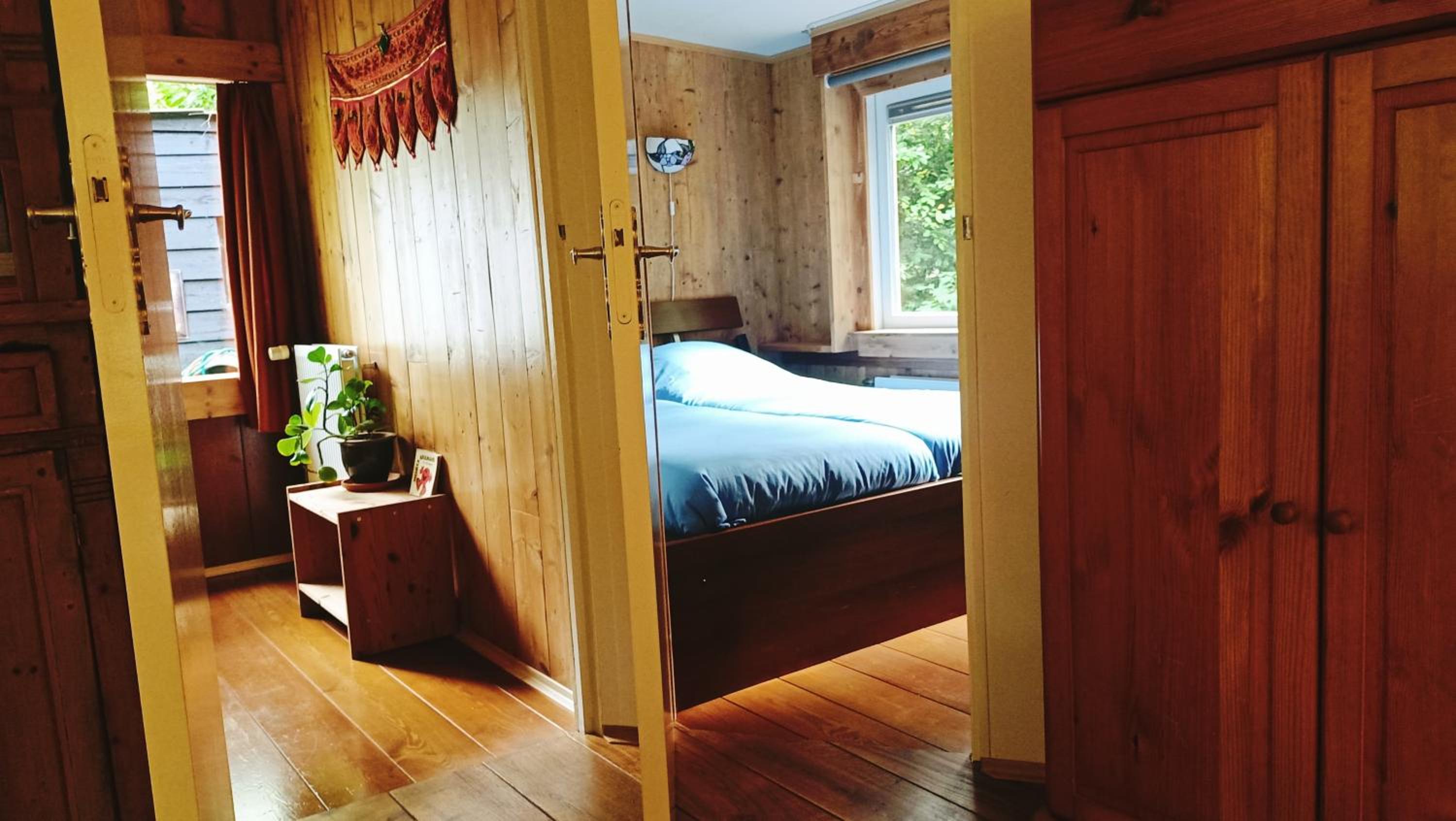 Het Houten Boshuisje