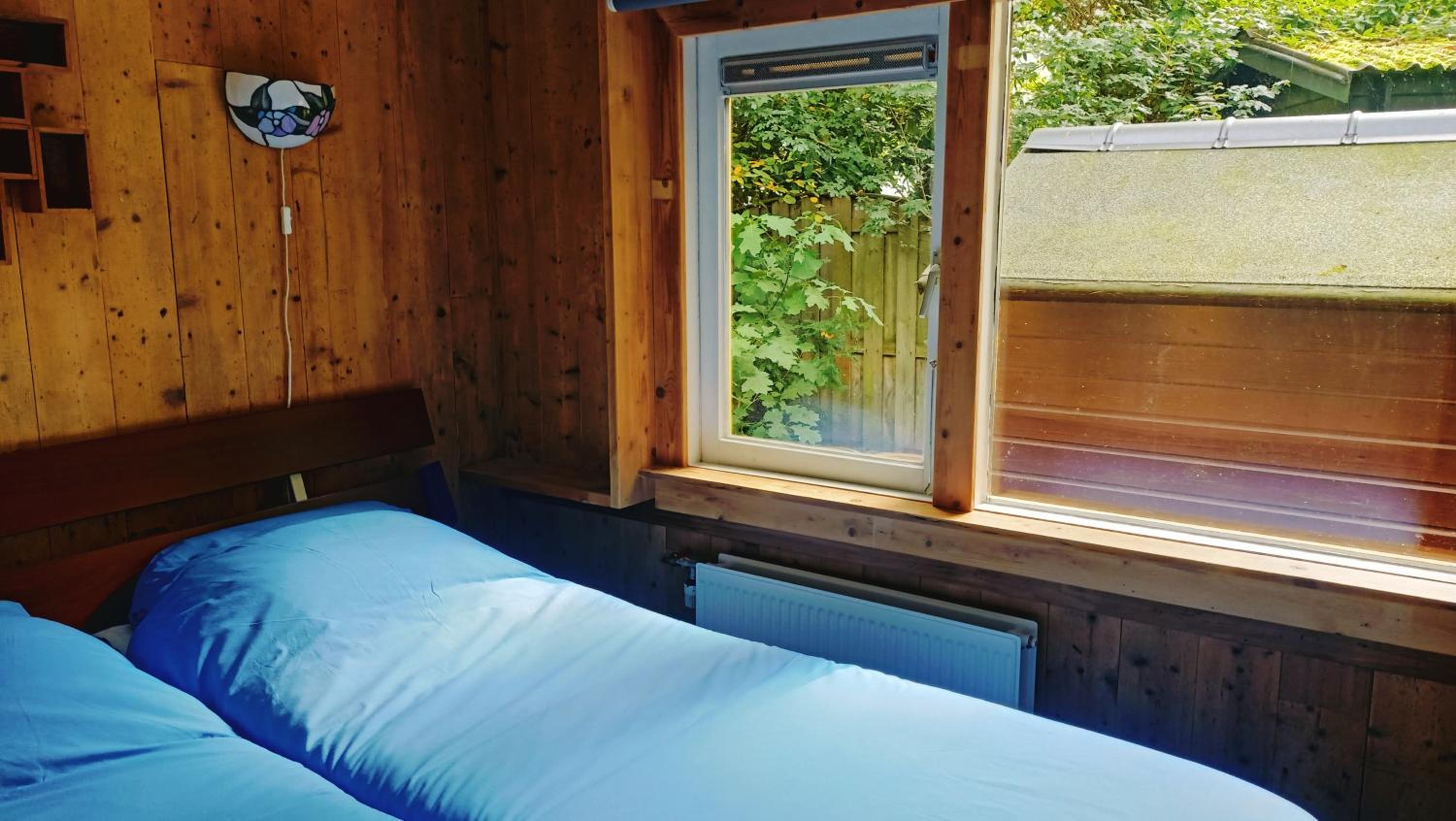 Het Houten Boshuisje