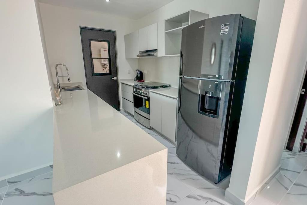 Departamento nuevo con alberca en Cancún