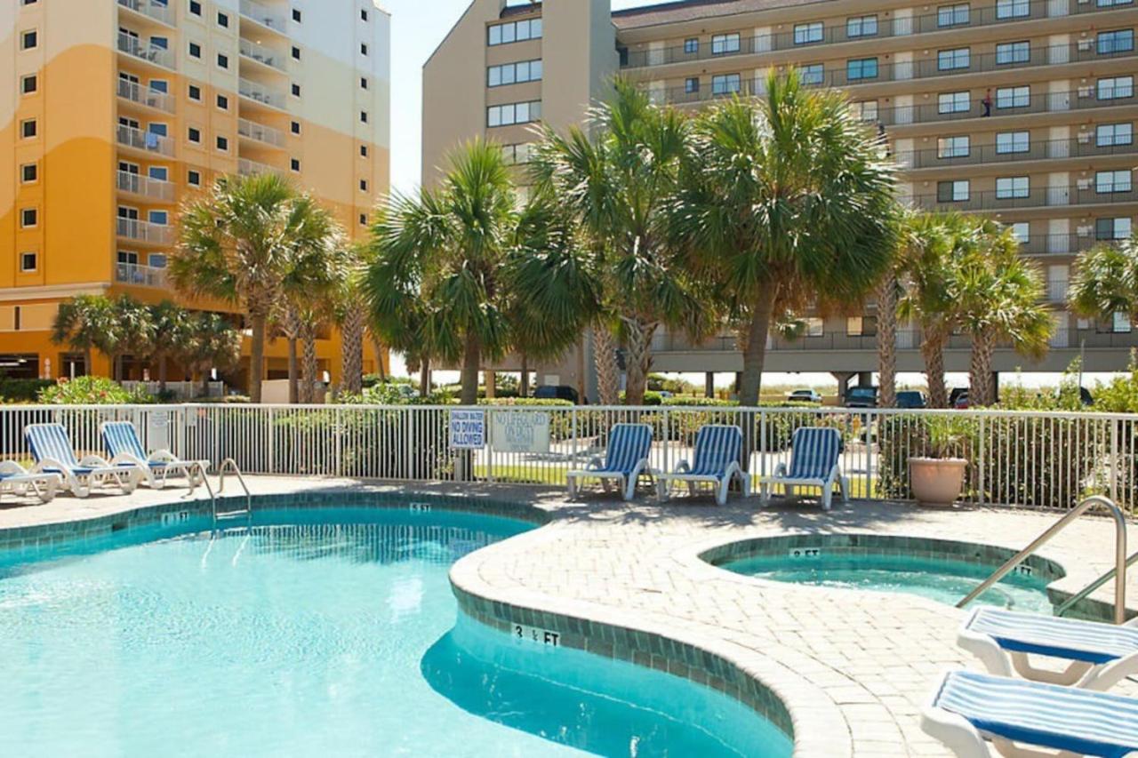 Beach themed 1BD condo with resort amenities including lazy river