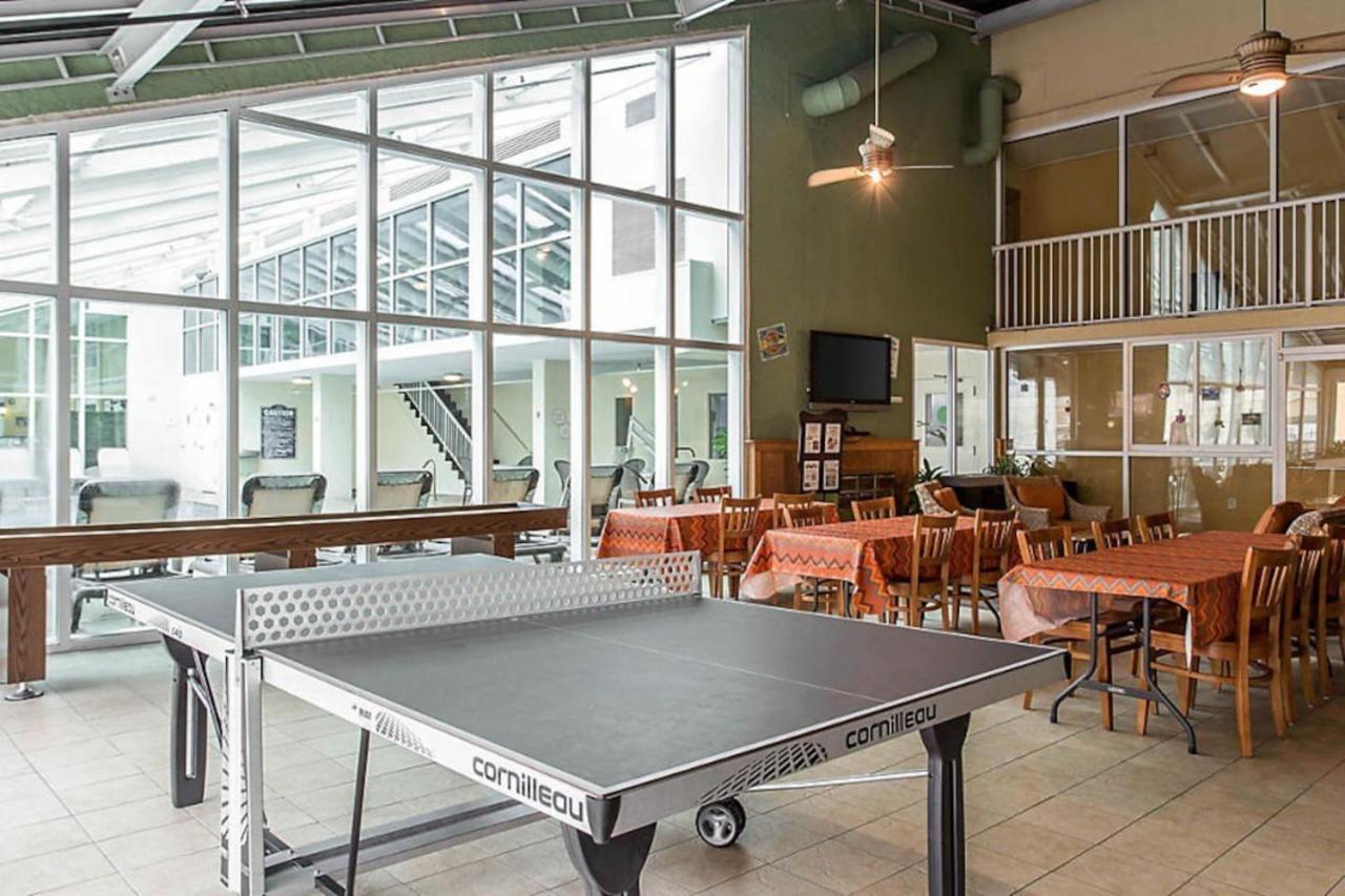 Beach themed 1BD condo with resort amenities including lazy river