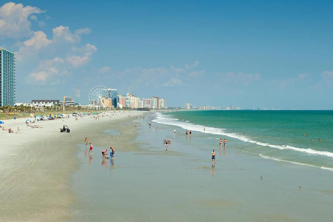 Beach themed 1BD condo with resort amenities including lazy river