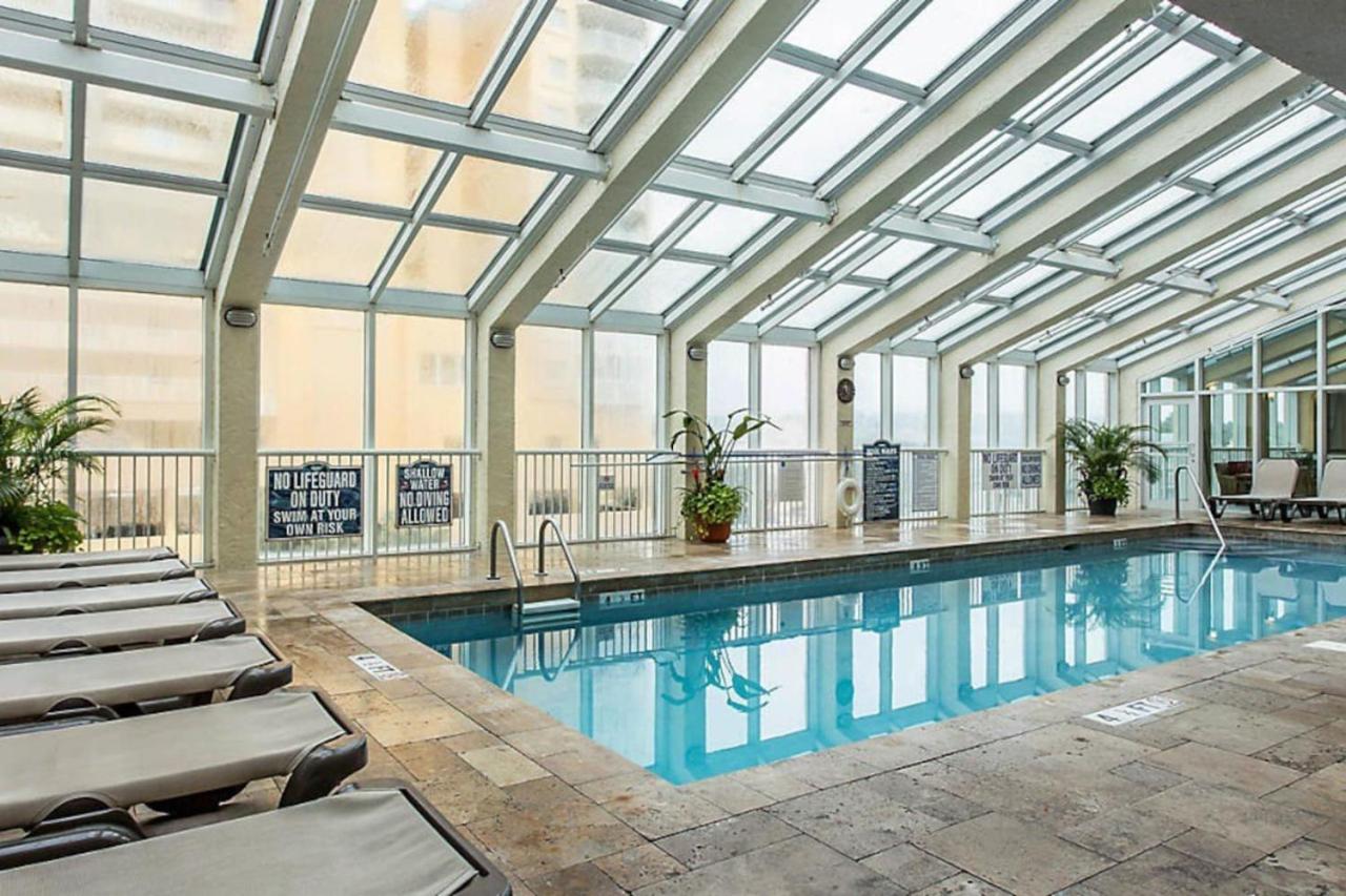 Beach themed 1BD condo with resort amenities including lazy river