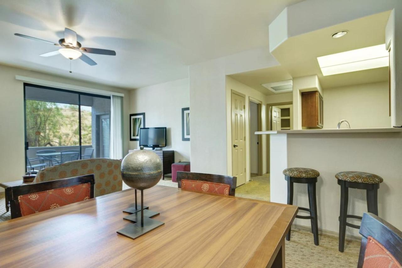 Enjoy the beautiful setting with your family in this 2BD condo with resort amenities view 4