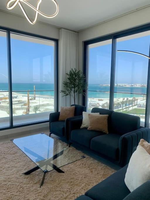 Elegant 3 BR APT footsteps from a mall & a beach