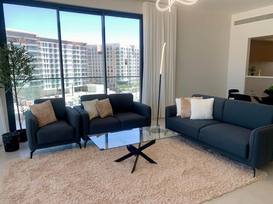 Elegant 3 BR APT footsteps from a mall & a beach