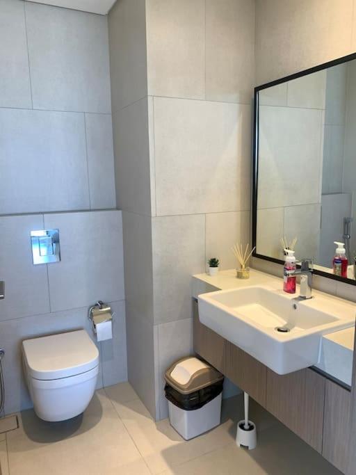 Elegant 3 BR APT footsteps from a mall & a beach