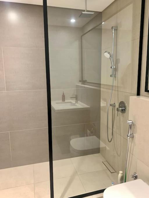 Elegant 3 BR APT footsteps from a mall & a beach
