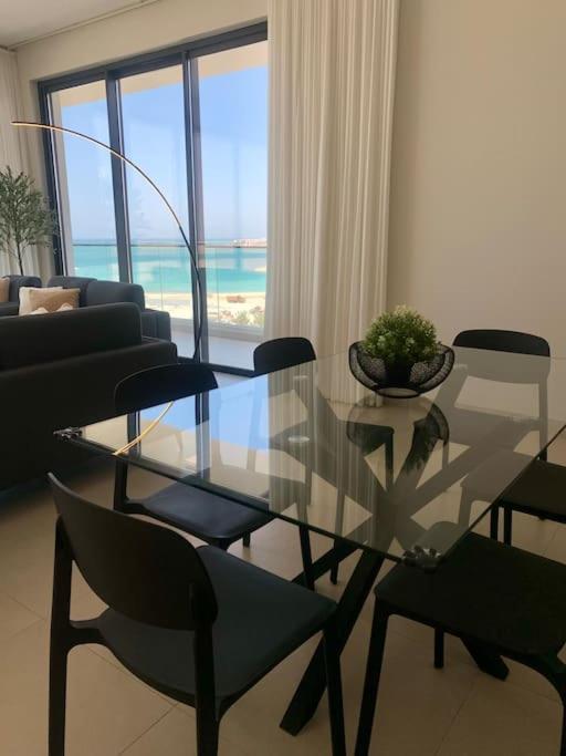Elegant 3 BR APT footsteps from a mall & a beach