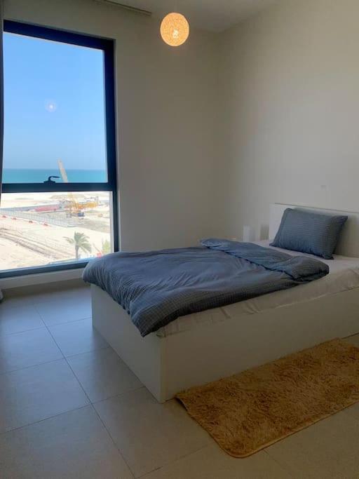 Elegant 3 BR APT footsteps from a mall & a beach