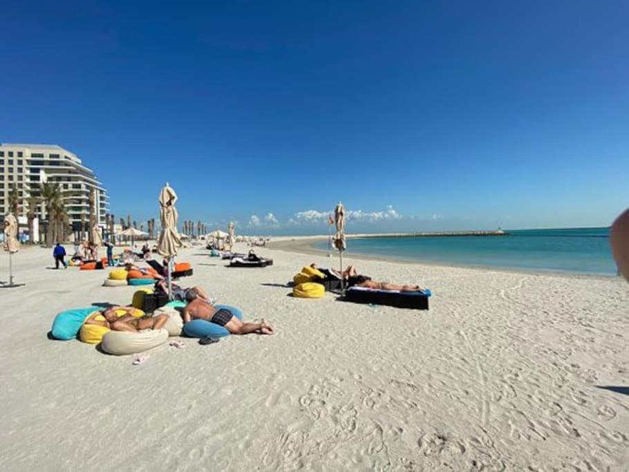 Elegant 3 BR APT footsteps from a mall & a beach