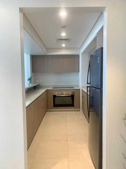 Elegant 3 BR APT footsteps from a mall & a beach