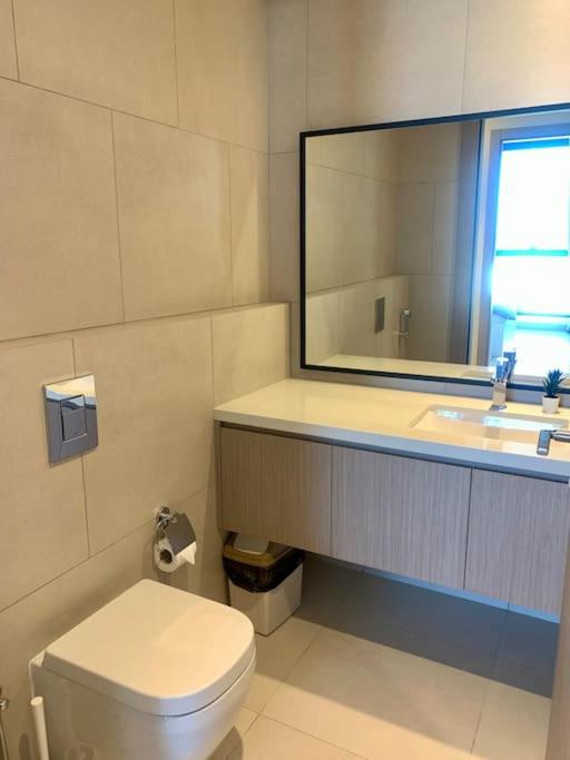 Elegant 3 BR APT footsteps from a mall & a beach