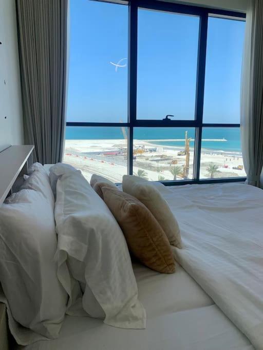 Elegant 3 BR APT footsteps from a mall & a beach