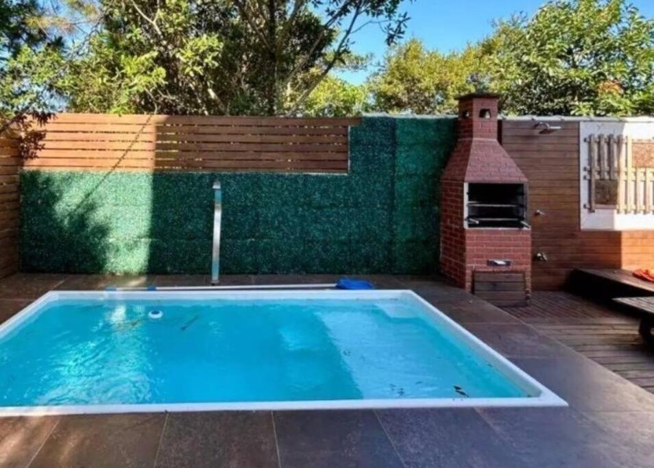 Casa de condomínio com SPA, piscina e vista para o mar do Campeche