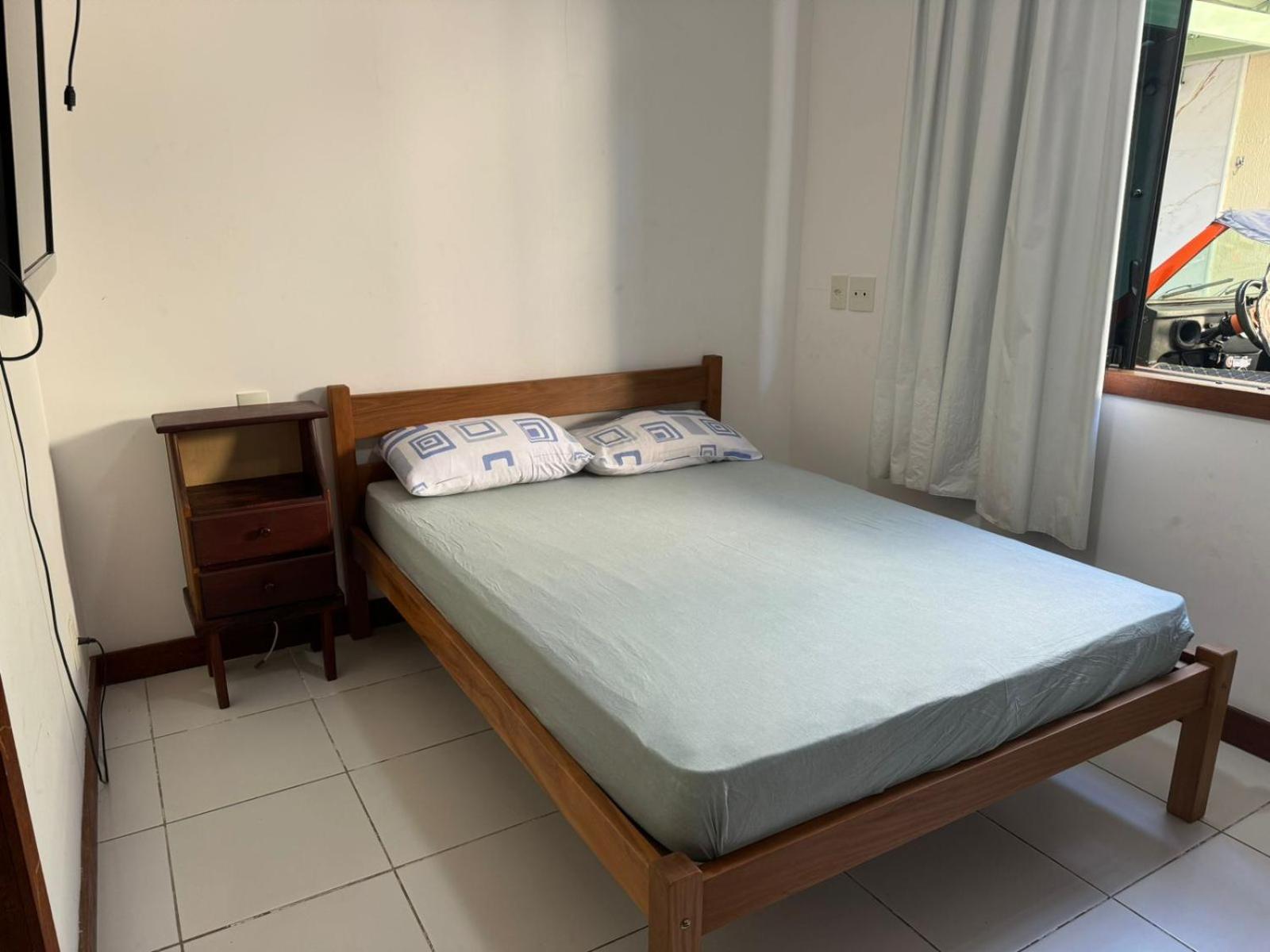 Casa com 4 suítes perto da praia