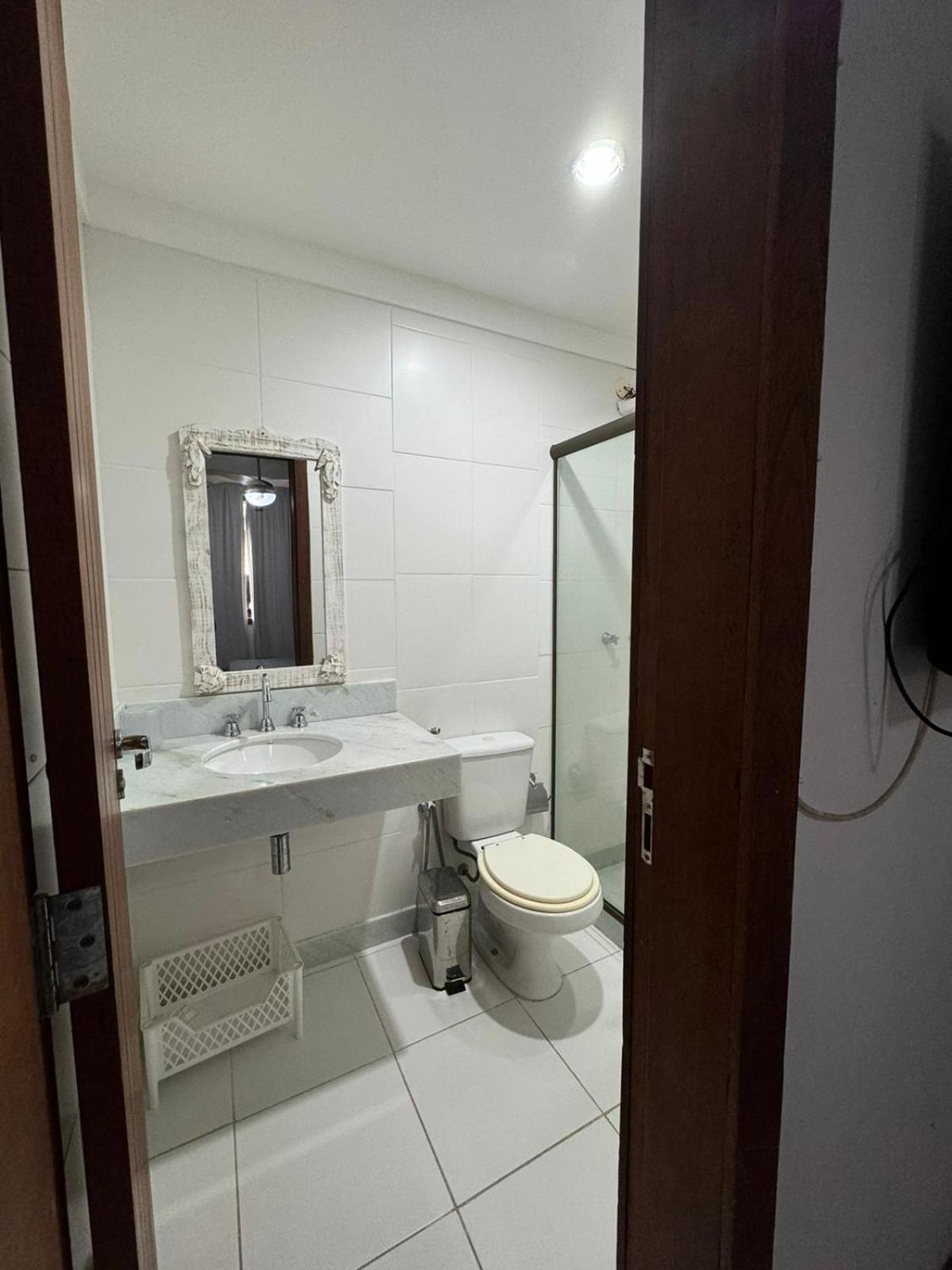 Casa com 4 suítes perto da praia
