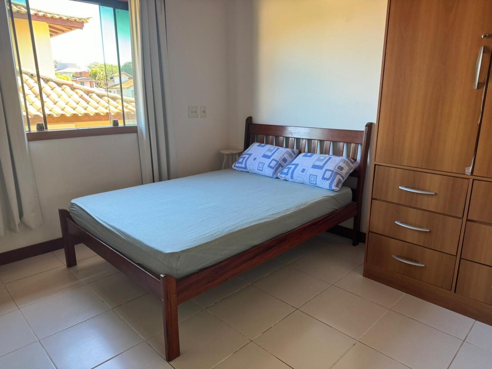 Casa com 4 suítes perto da praia