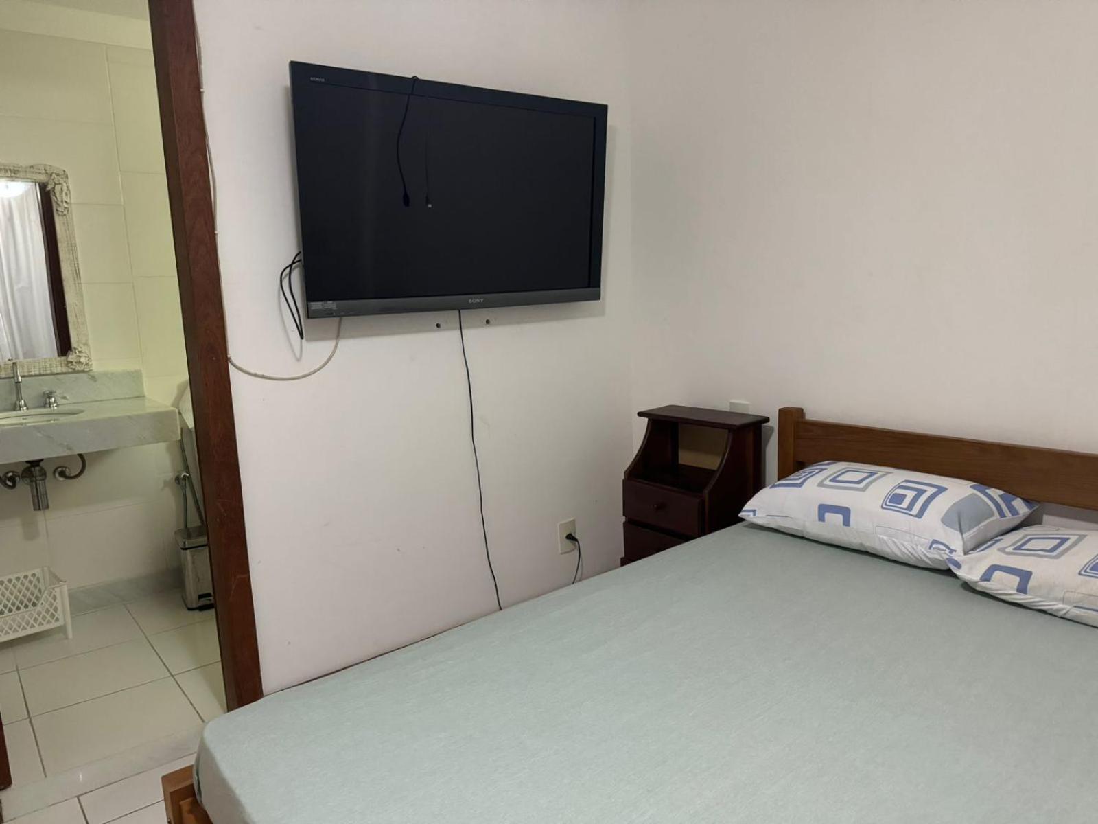 Casa com 4 suítes perto da praia
