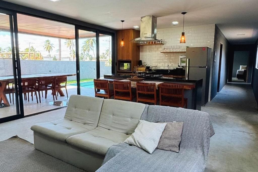 Casa em Milagres| 3 suítes, área gourmet, piscina