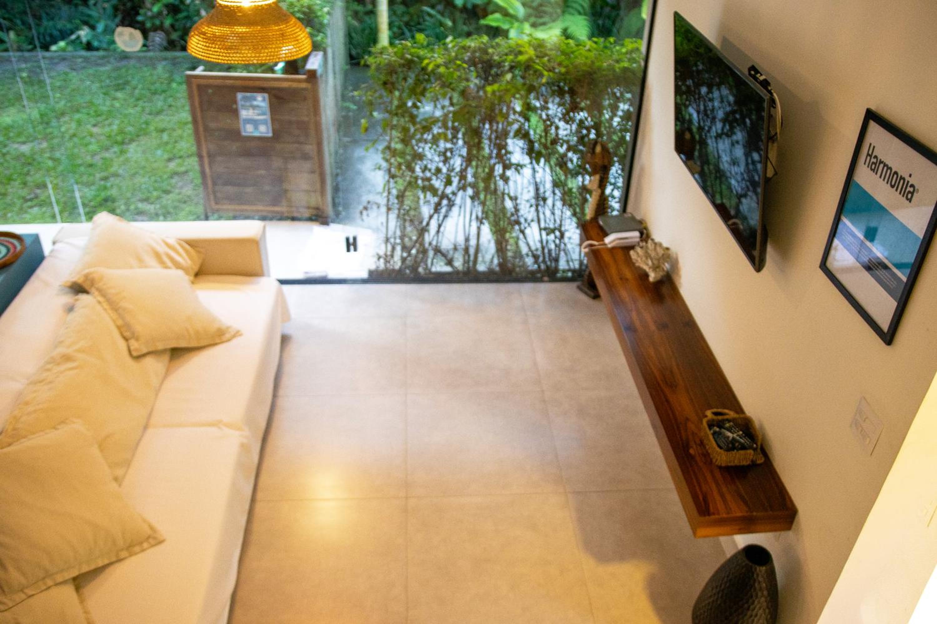 Casa completa com piscina em frente à praia em Maresias