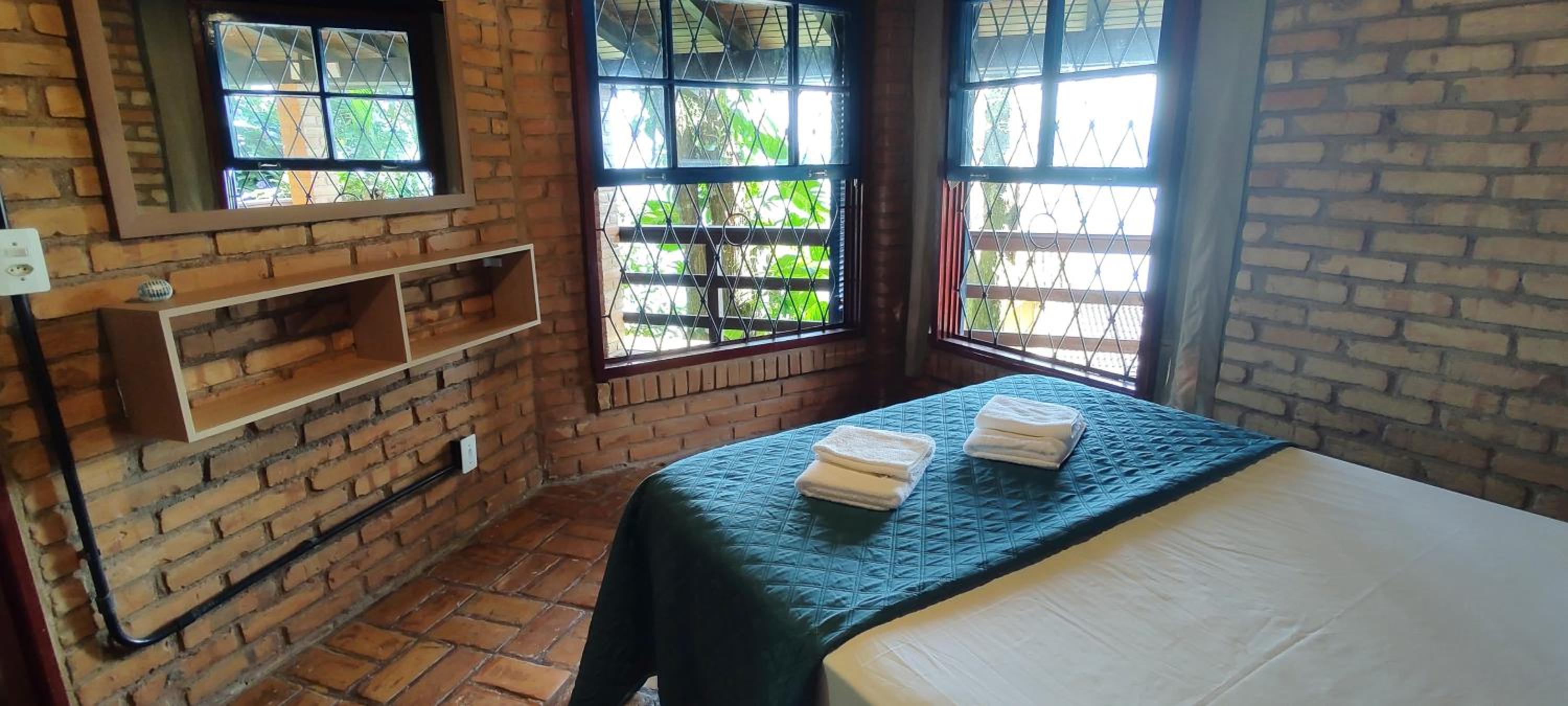 Casa em meio a natureza e em frente a praia PR7688
