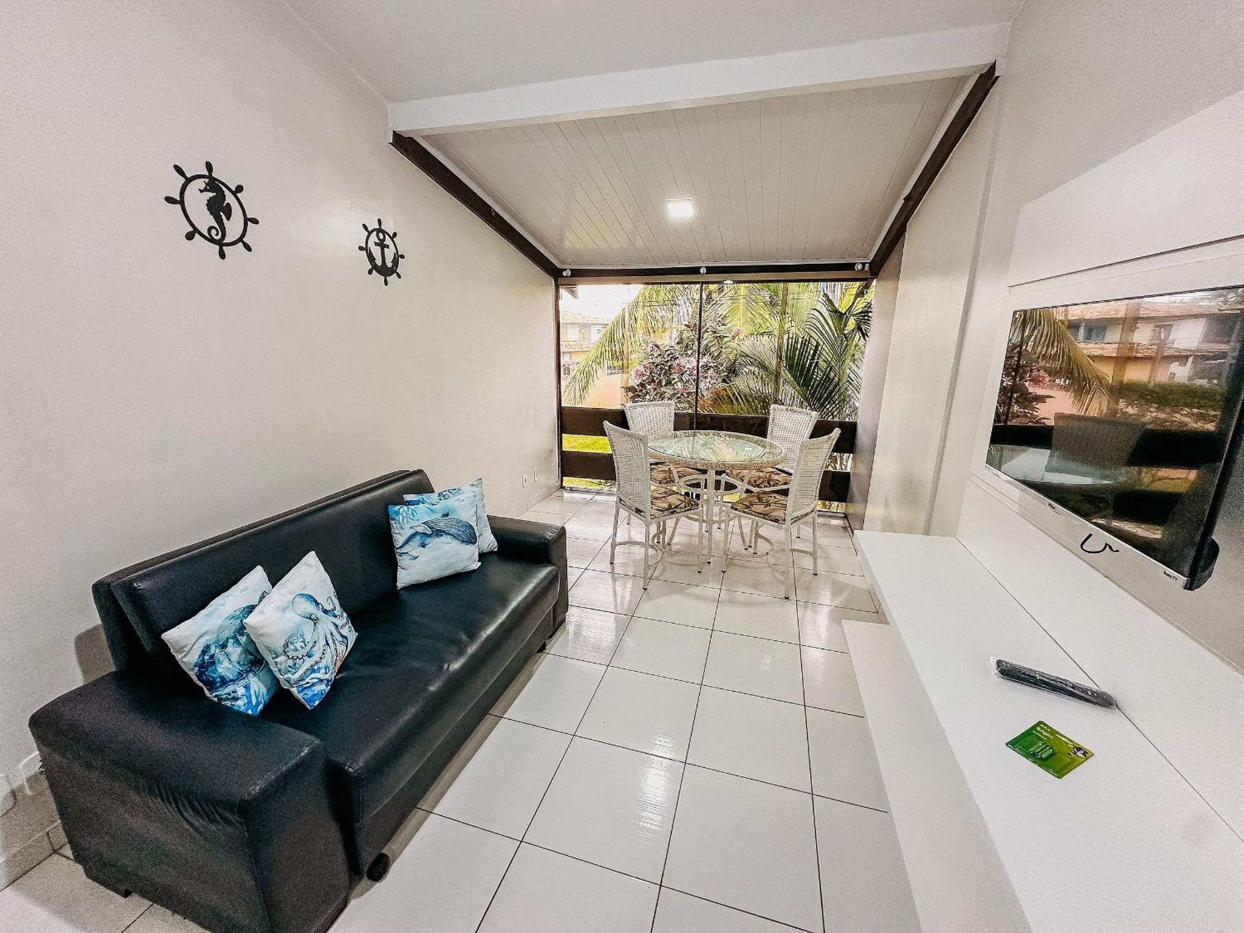 Flat com 1 quarto com ar split, sala e cozinha completa, No condomínio Portal do Atlântico a 100m praia de Taperapuã (Barraca do Gaúcho) , portaria 24hrs,