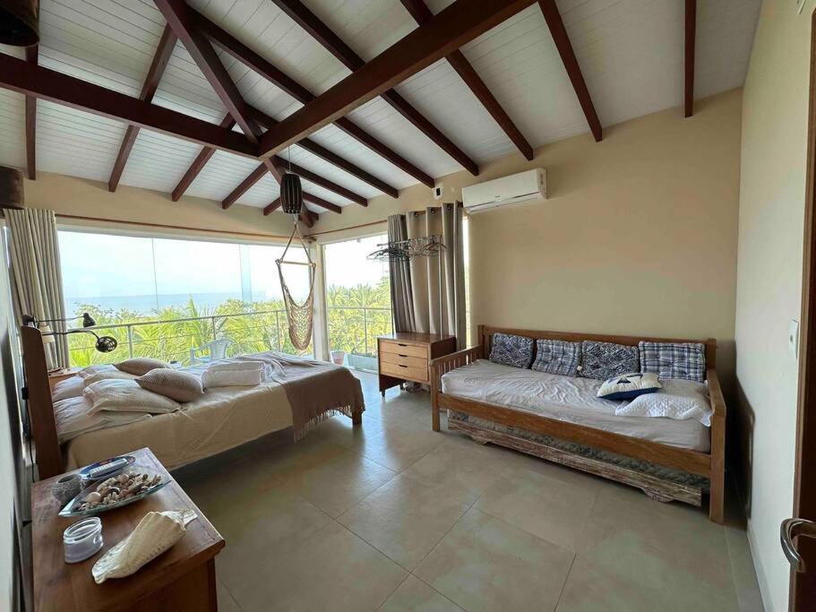 Casa pé na areia praia de Guaecá
