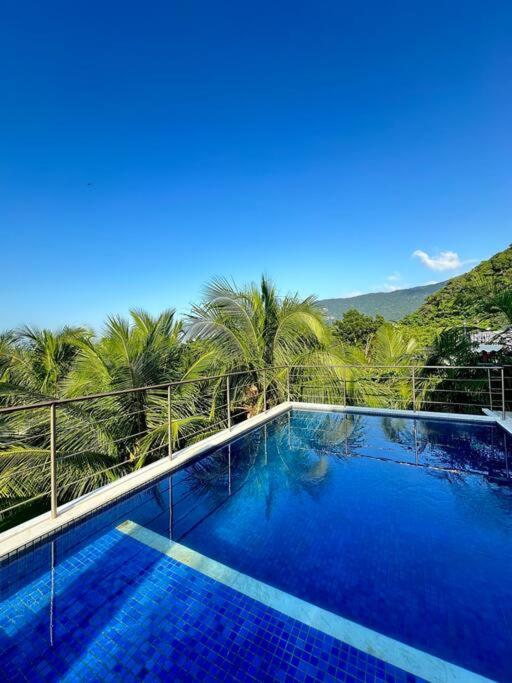 Casa pé na areia praia de Guaecá