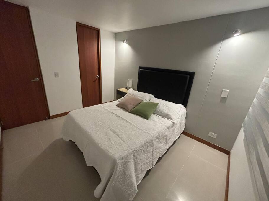 Apartment tower in the middle of a forest, 2 bed