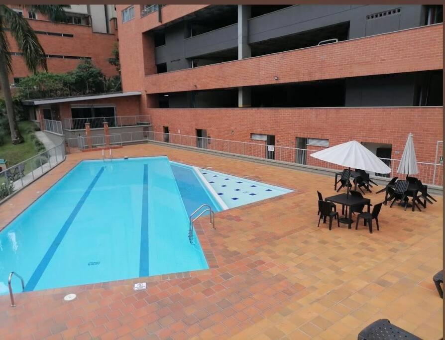 Apartment tower in the middle of a forest, 2 bed