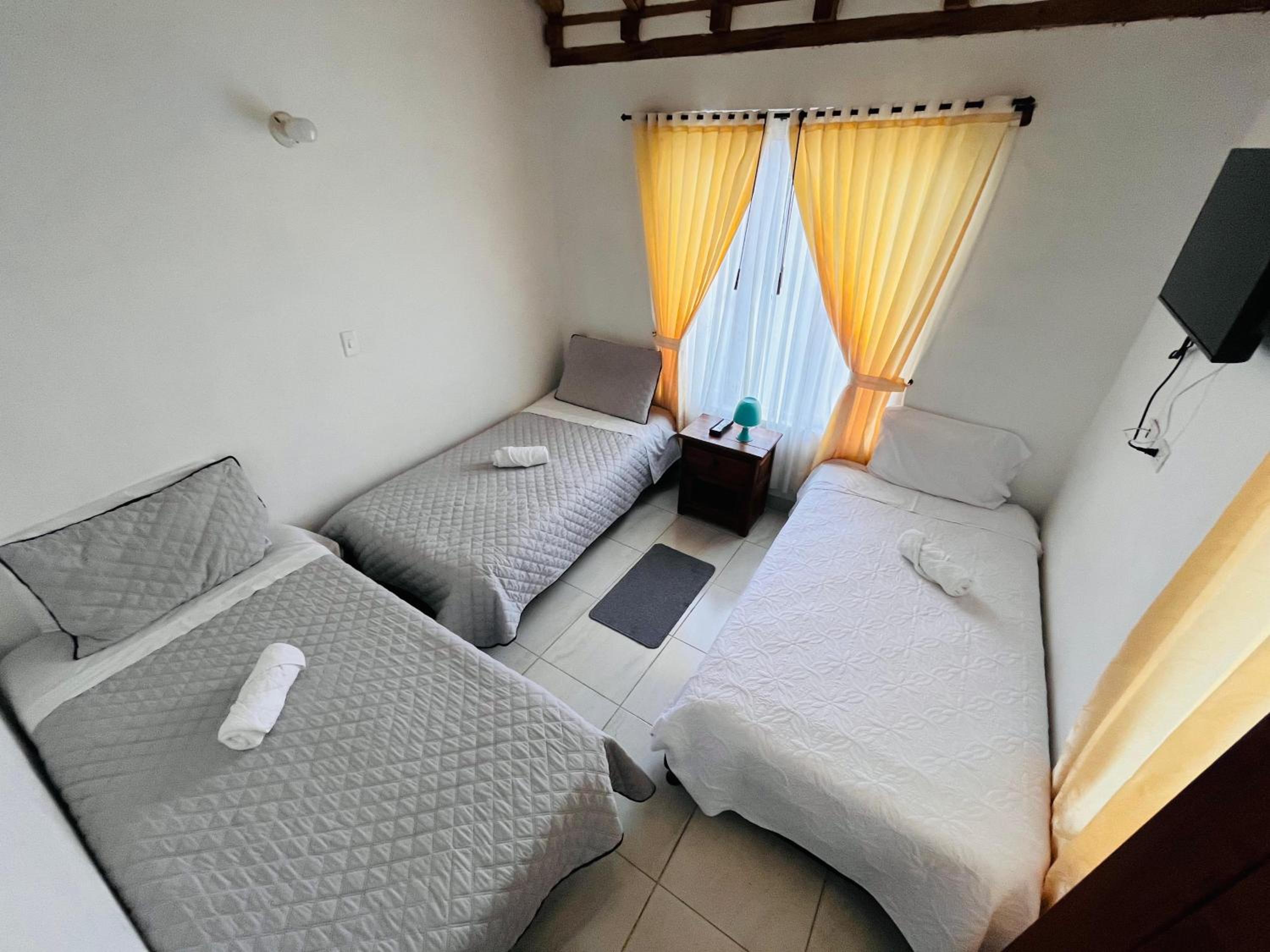 Tres habitaciones en la cabaña Quinta Buenos Aires