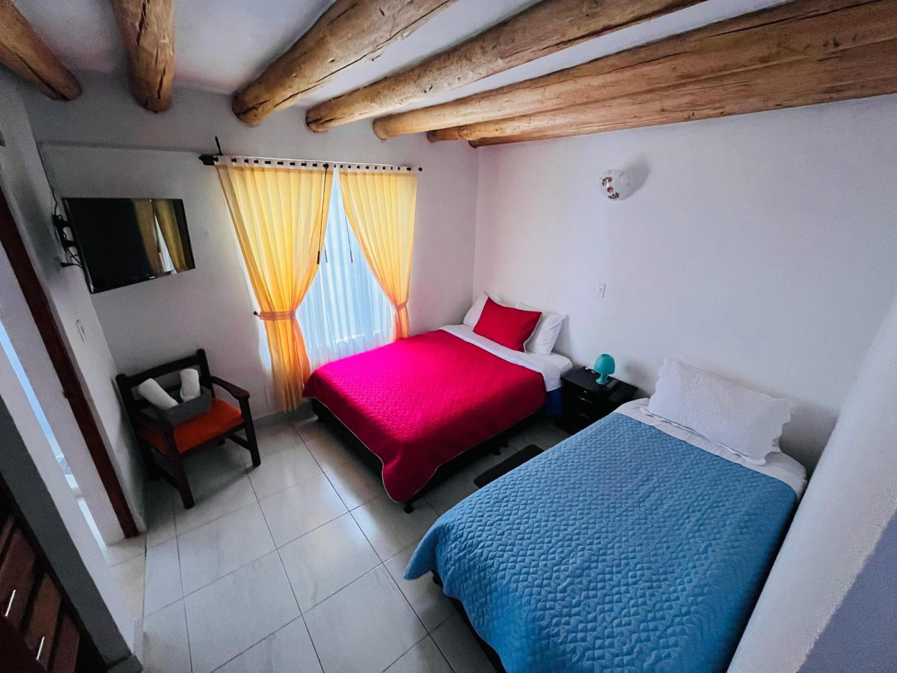 Tres habitaciones en la cabaña Quinta Buenos Aires