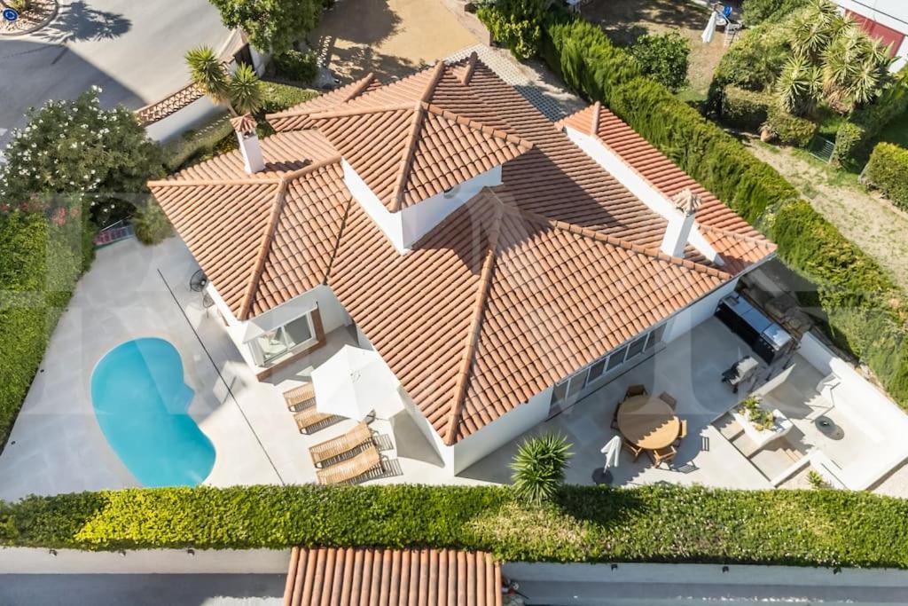 Exclusive poolside villa with cine & BBQ by REMS view 5