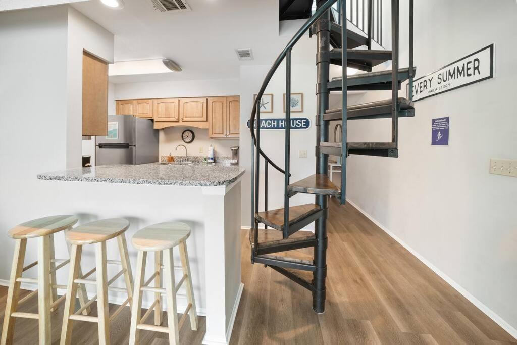 Cozy Condo with Private Beach Access and Balcony Overlooking the Heated Pool view 5