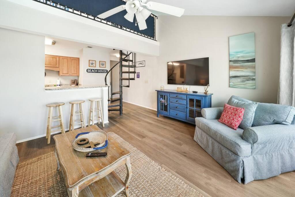 Cozy Condo with Private Beach Access and Balcony Overlooking the Heated Pool view 4
