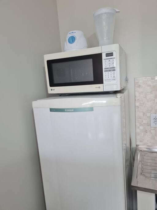 Kitnet 306 centro, com linda vista janela, tv smart