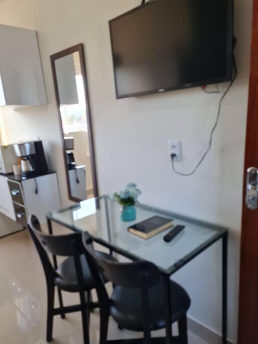 Kitnet404 central, com tv smart,linda vista para janela