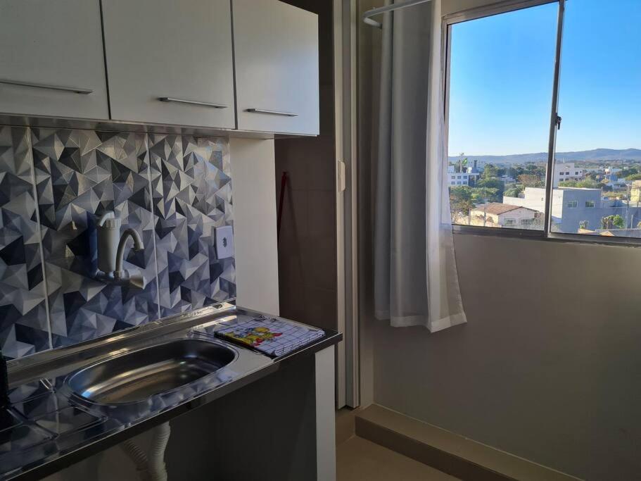 Kitnet404 central, com tv smart,linda vista para janela