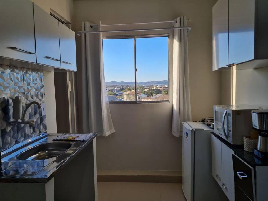 Kitnet404 central, com tv smart,linda vista para janela