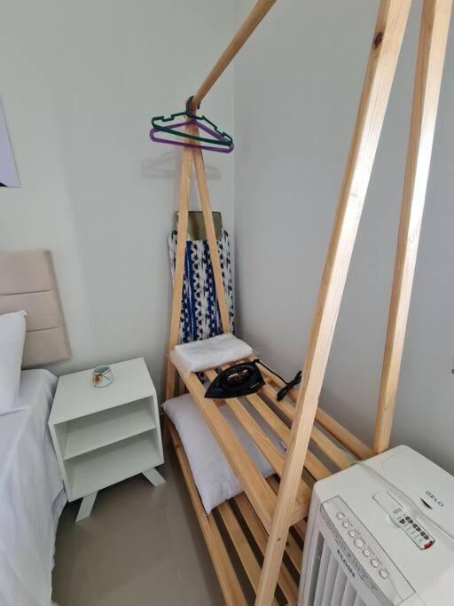 Kitnet404 central, com tv smart,linda vista para janela