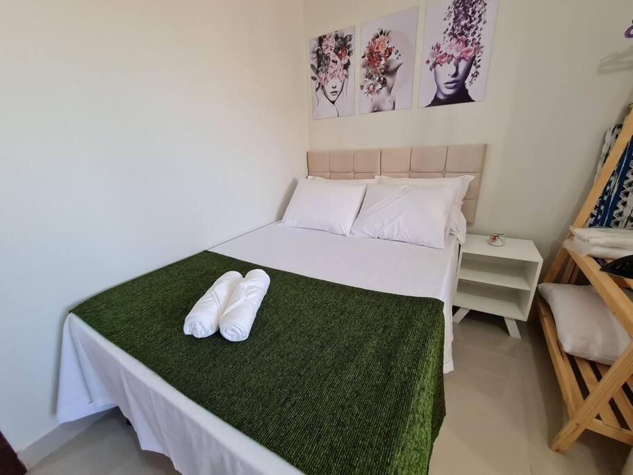 Kitnet404 central, com tv smart,linda vista para janela