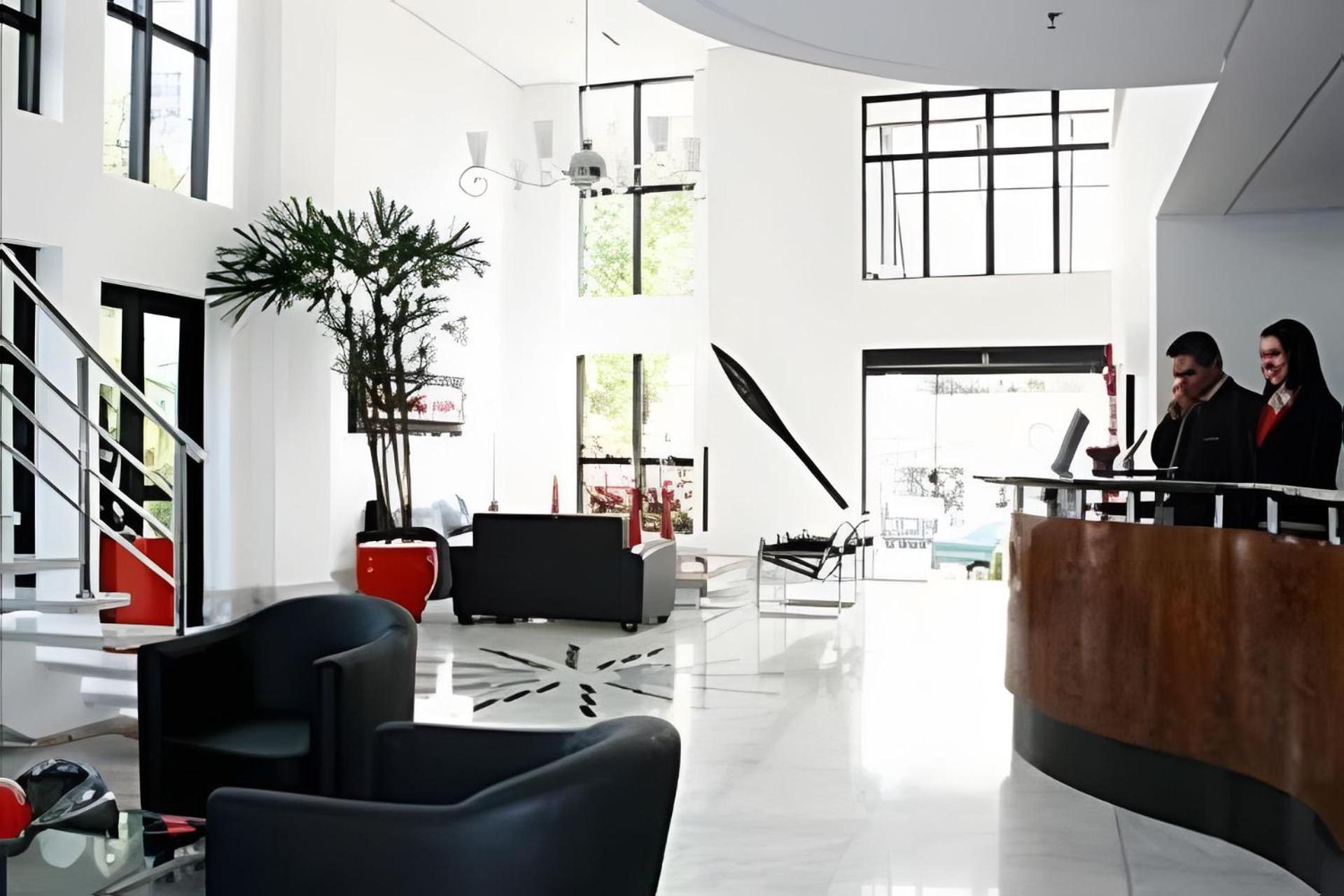 Flat Hotel The Palace com quarto sala e cozinha