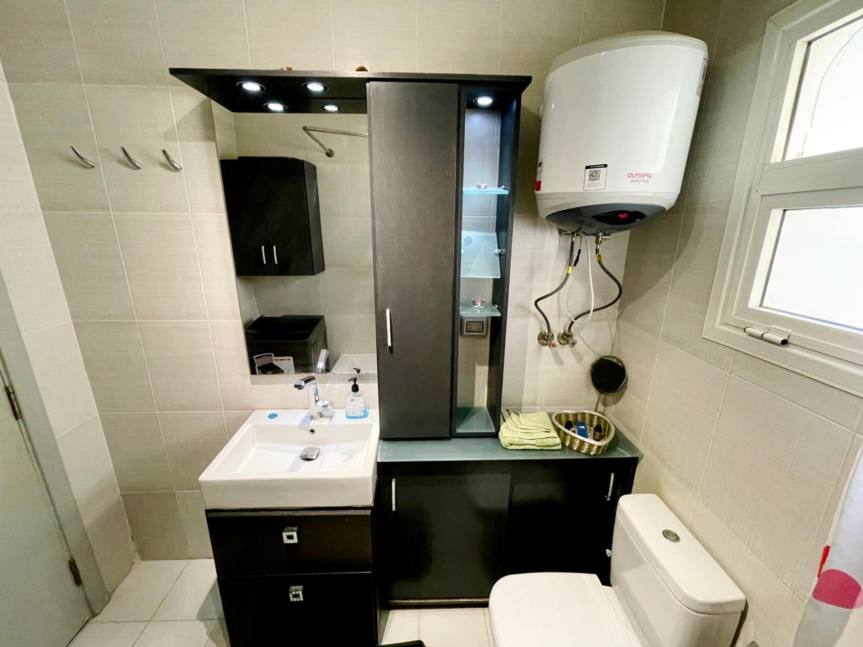 2BR Apartment with Private Garden in Downtown Rehab Near Malls